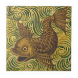 William De Morgan Repro Dolphin Tile (facing left)<br><div class="desc">De Morgan was an important Arts & Crafts movement artist and was the had of tile production at William Morris's studio. The circular swirls are characteristic of his work, which was influenced by Persian and Islamic art. This is the left facing dolphin tile. We also have a tile with a...</div>
