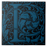 William Morris Blue Monogrammed Letter L Tile<br><div class="desc">Art Nouveau monogrammed tile designs by William Morris are the prefect arts and craft touch to add to your antique fireplace,
These initial tiles come in all the letters of the alphabet and are the prefect vintage floral.</div>