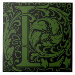 William Morris Green Monogrammed Letter L Tile<br><div class="desc">Art Nouveau monogrammed tile designs by William Morris are the prefect arts and craft touch to add to your antique fireplace,
These initial tiles come in all the letters of the alphabet and are the prefect vintage floral.</div>