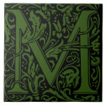 William Morris Green Monogrammed Letter M Tile<br><div class="desc">Art Nouveau monogrammed tile designs by William Morris are the prefect arts and craft touch to add to your antique fireplace,   
These initial tiles come in all the letters of the alphabet and are the prefect vintage floral.</div>