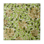 William Morris Honeysuckle Green Flowers Tile<br><div class="desc">The "Honeysuckle" wallpaper, designed by May Morris in 1883, became one of her most celebrated and enduring designs during her tenure at Morris & Co. This intricate pattern features a network of wild, woody stems intertwined with curling leaves in two tones and delicate honeysuckle flowers, all set against a plain...</div>
