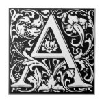 William Morris Monogrammed Letter A Ceramic Tile<br><div class="desc">This is a reproduction of the work of William Morris (1834 – 1896) best known as the 19th century's most celebrated designer and a key figure in the British Arts & Crafts Movement. William Morris Renaissance Style Cloister Alphabet Letter "A" tile in white and black is suitable for interiors and...</div>