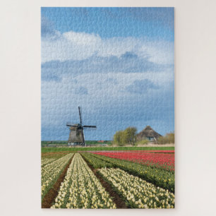 Windmill and tulips in a vertical spring landscape jigsaw puzzle