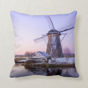 Windmill during sunrise in Holland throw pillow
