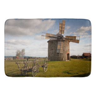 Windmill in Green Field & White Clouds & Blue Sky Bath Mat