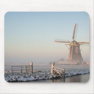 Windmill in the snow at sunrise mousepad