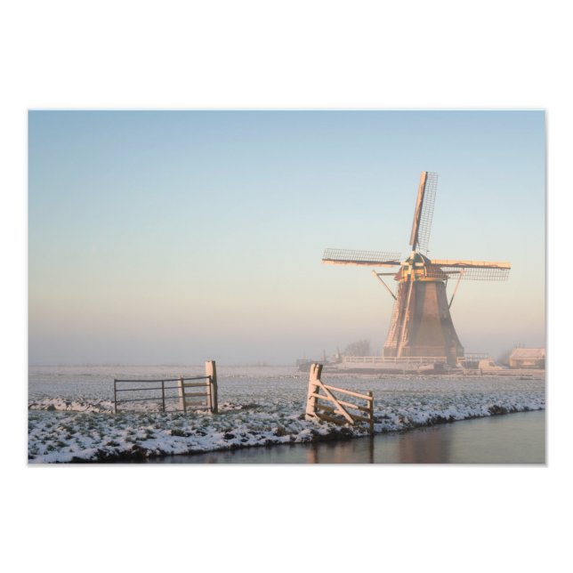 Windmill in the snow at sunrise photo print (Front)