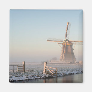 Windmill in the snow at sunrise square magnet