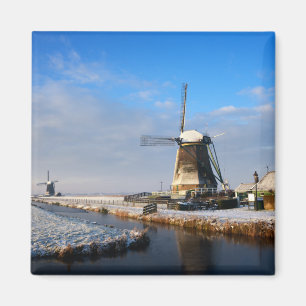 Windmill in the snow in a dutch winter landscape magnet