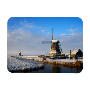 Windmill in the snow in a dutch winter landscape magnet