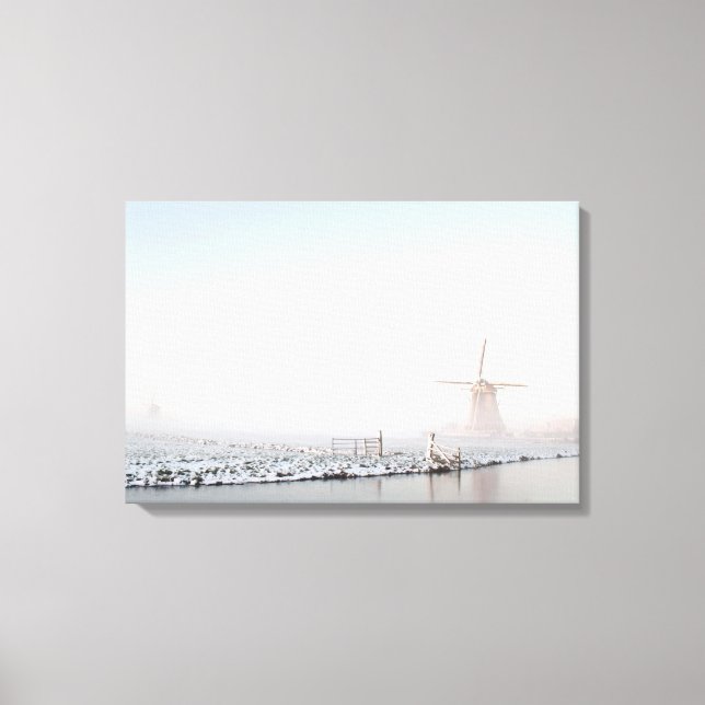 Windmill in the snow in winter canvas print (Front)