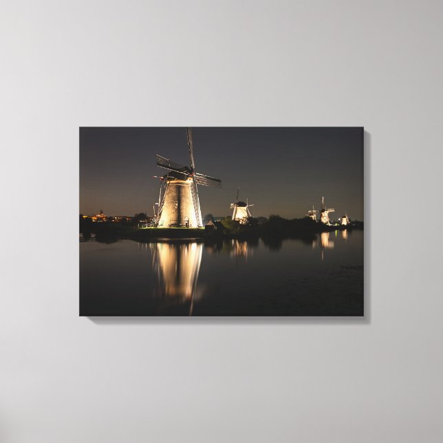 Windmills illuminated at night canvas print (Front)