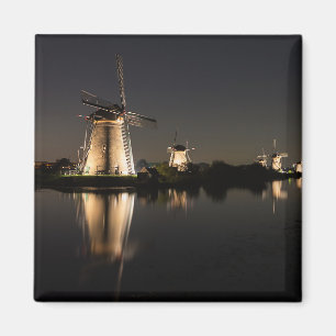 Windmills illuminated at night magnet