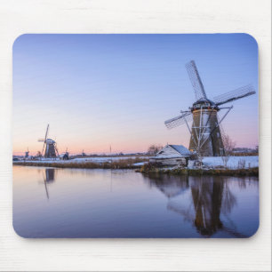 Windmills in winter during a sunrise mousepad