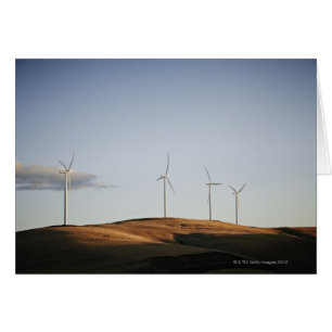 Windmills on hill at sunset 2