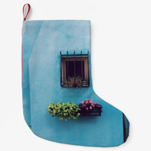 WINDOW WITH FRAME ABOVE GREEN AND PINK PETALED FLO SMALL CHRISTMAS STOCKING