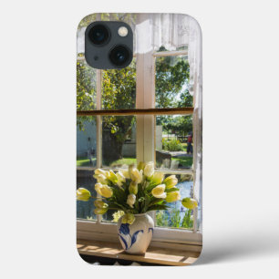 Window with lace curtain and tulips iPhone 13 case