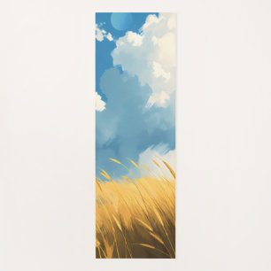 windswept grassland with golden grasses and a mist yoga mat