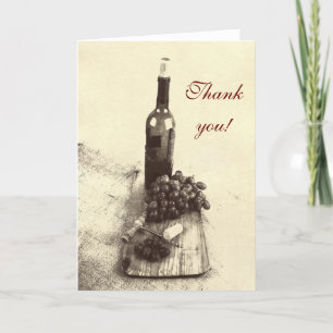 Wine bottle, corks, grapes and corkscrew on wood thank you card