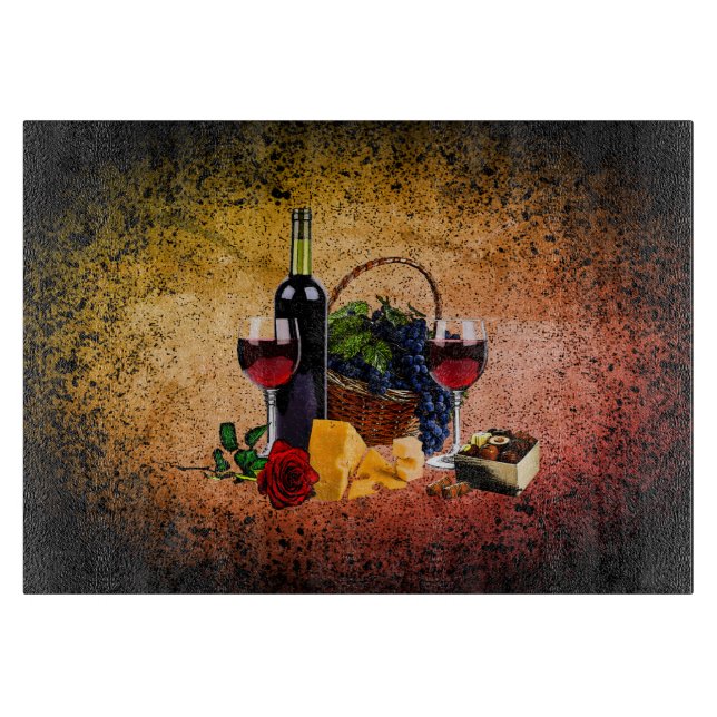 Wine glasses, bottle, grapes, cheese, chocolates cutting board (Front)