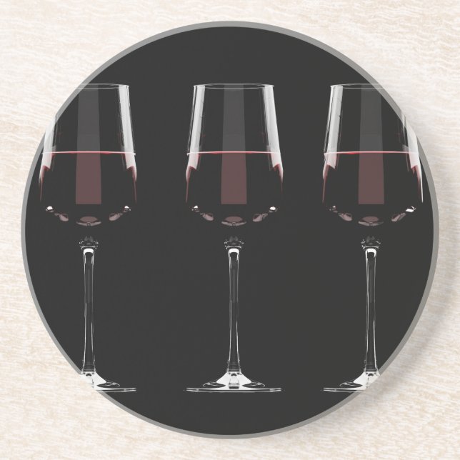 Wine glasses with red wine on black coaster (Front)