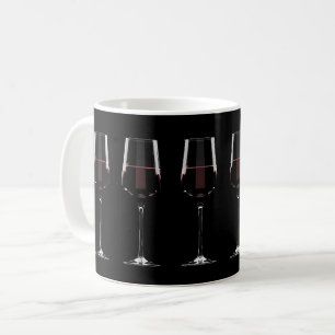 Wine glasses with red wine on black coffee mug