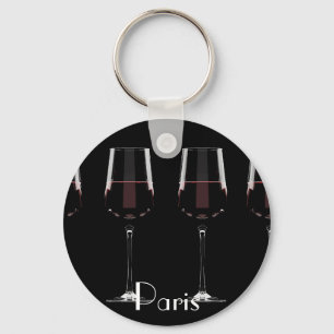 Wine glasses with red wine on black key ring