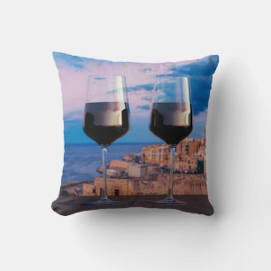 Wine glasses with view of sunset over Valletta Cushion
