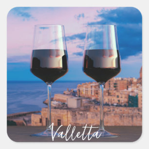 Wine glasses with view of sunset over Valletta Square Sticker