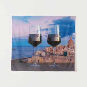 Wine glasses with view of sunset over Valletta Tapestry