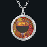 Wine lover's necklace<br><div class="desc">This is a fun necklace featuring a glass of red wine with fall coloured leaves in the background. Makes a great gift too!</div>