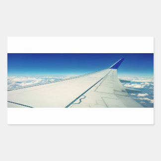 Wing view from airplane during flight rectangular sticker