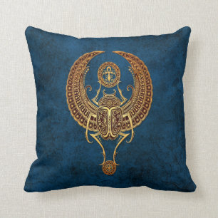 Winged Egyptian Scarab Beetle with Ankh on Blue Cushion