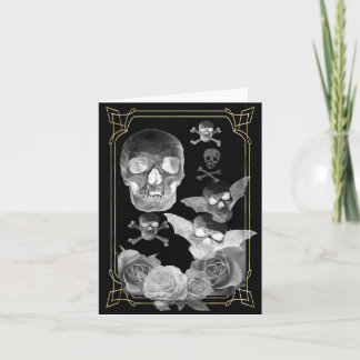 Winged flying skulls card