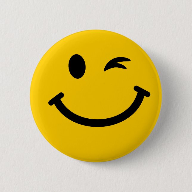 Winking face 6 cm round badge (Front)