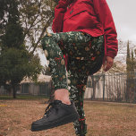 Winter Botanical Festive Christmas Leggings<br><div class="desc">Embrace the holiday season in style with our winter botanical Christmas leggings. Featuring a cheerful mix of holly,  berries,  winter florals,  pinecones,  baubles,  bows,  and bells on a lush dark green backdrop,  these leggings are the perfect way to add a touch of festive flair to any outfit.</div>