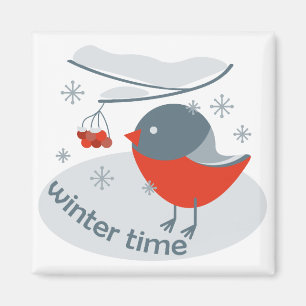 Winter bullfinch bird and red rowan berries magnet