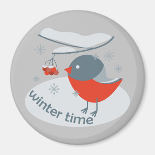 Winter bullfinch bird and red rowan berries magnet
