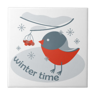Winter bullfinch bird and red rowan berries tile