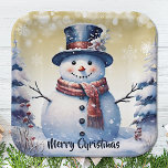 Winter Forest Snowman Christmas | Gold Paper Plate<br><div class="desc">Bring the charm of a winter forest to your holiday gatherings and Christmas parties with this Gold Winter Forest Snowman Paper Plates. These sturdy plates feature a delightful smiling snowman surrounded by snowy pine trees and white snowflakes, with falling snow adding a festive touch. The festive script displaying "Merry Christmas"...</div>