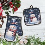 Winter Forest Snowman Christmas Oven Mitt & Pot Holder Set<br><div class="desc">Add some holiday cheer to your holiday baking this year with a set of Winter Forest Snowman Christmas Oven Mitt and Pot Holder Set. Set design features a cute snowman in a charming top hat and scarf standing in a winter forest scene with falling snow. Additional kitchen items available with...</div>