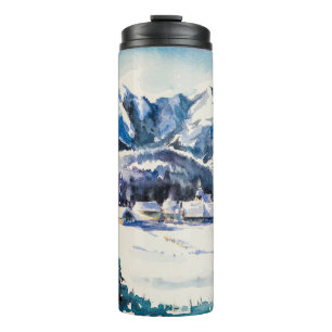 Winter landscape with mountain village covered wit thermal tumbler