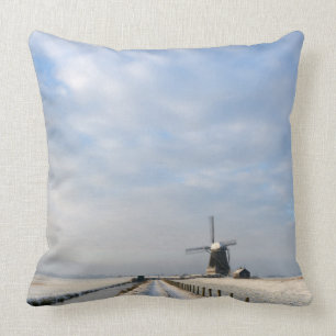 Winter landscape with snow and windmill in Holland Cushion