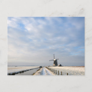 Winter landscape with snow and windmill in Holland Postcard