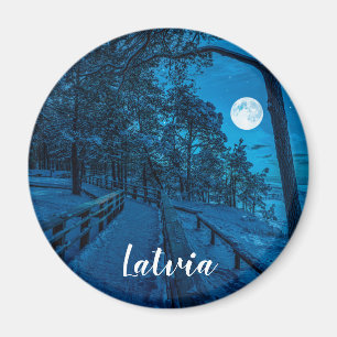 Winter landscape with snow covered pine forest magnet