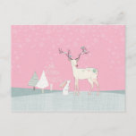 Winter Reindeer and Bunny in Falling Snow Postcard<br><div class="desc">Beautiful,  modern,  whimsical winter scene with a white reindeer decorated with floral elements and birds in his antlers standing next to a cute white bunny rabbit and contemporary Christmas trees with elegant snowflakes falling from the pretty pink sky.</div>