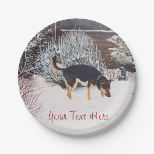 Winter snow scene with cute black and tan dog paper plate