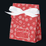 Winter Snowflake Christmas Red Holiday Greeting Favour Box<br><div class="desc">Christmas red favour box with ribbon bow and simple holiday greeting tag. Box is emblazoned with white and grey snowflakes of varying sizes. Perfect for party take-aways, host gifts, baked goods, and more. Design is available in a curated collection of modern holiday colours. Contact us for any customisations. Happy holidays!...</div>