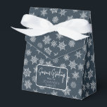 Winter Snowflake Navy Blue Holiday Greeting Favour Box<br><div class="desc">Navy blue favour box with ribbon bow and simple holiday greeting tag. Box is emblazoned with white and grey snowflakes of varying sizes. Perfect for party take-aways, host gifts, baked goods, and more. Design is available in a curated collection of modern holiday colours. Contact us for any customisations. Happy holidays!...</div>