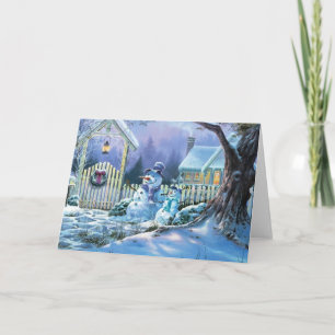 Winter Snowman In Front Of A Christmas Cottage Holiday Card